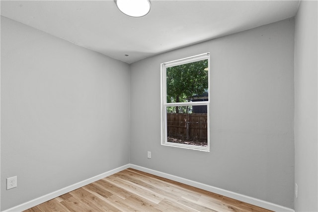 empty room with light wood-type flooring