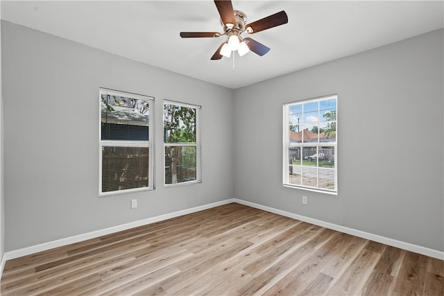 unfurnished room featuring light hardwood / wood-style floors and ceiling fan