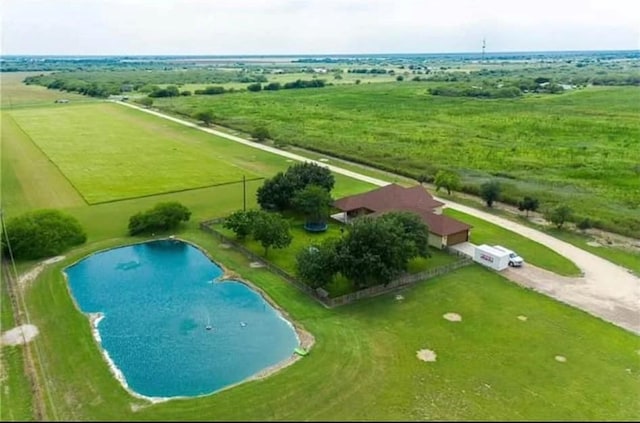 bird's eye view with a rural view and a water view