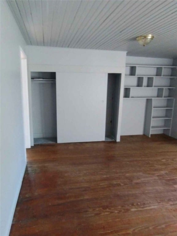 interior space featuring dark wood-type flooring