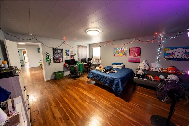 bedroom featuring wood finished floors