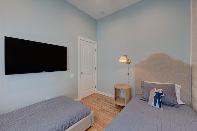 bedroom with light hardwood / wood-style flooring