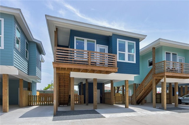 rear view of property featuring a carport