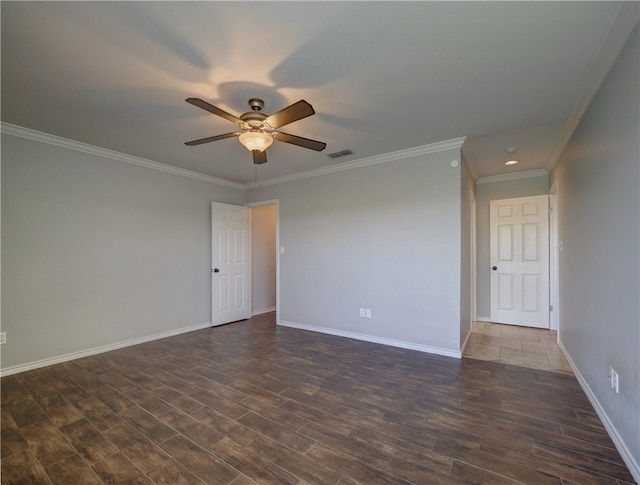 empty room featuring a ceiling fan, dark wood-style flooring, visible vents, and baseboards