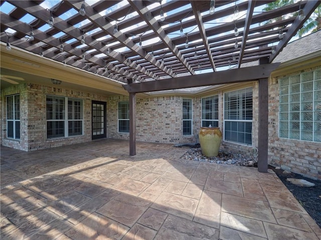 view of patio featuring a pergola