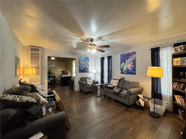 769 W Cornelia, Corpus Christi, TX 78408 - living room with wood finished floors, ceiling fan, a textured ceiling, and a wall mounted AC
