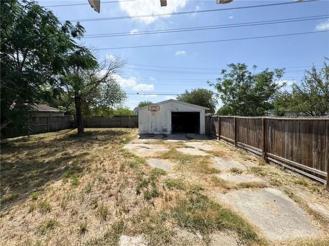 769 W Cornelia, Corpus Christi, TX 78408 - fenced backyard with a detached garage and a storage unit
