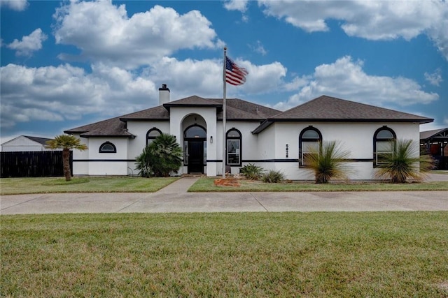 view of front of house with a front lawn