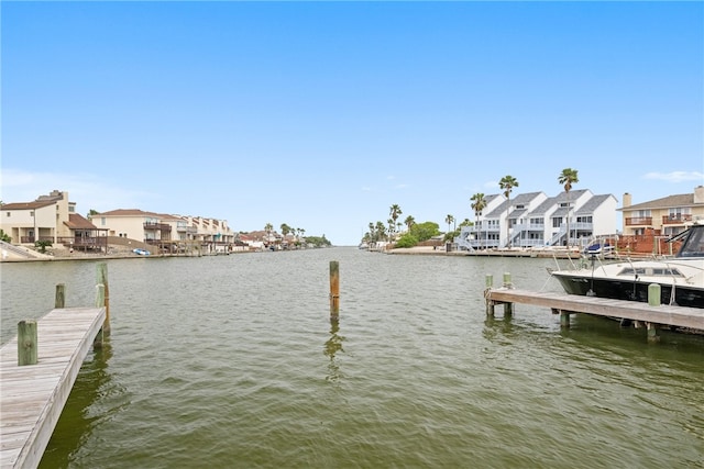 dock area with a water view