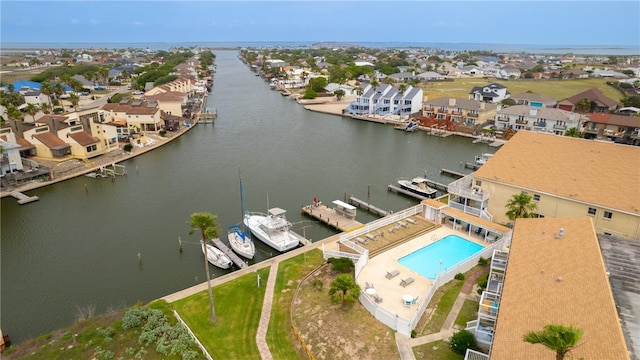 bird's eye view with a water view