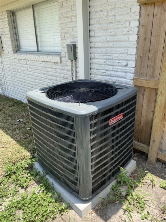 4917 Arlene Dr, Corpus Christi, TX 78411 - exterior view of cooling unit and brick siding