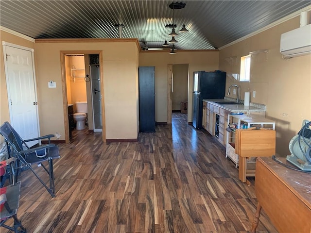 kitchen featuring ceiling fan, sink, dark wood-type flooring, an AC wall unit, and crown molding