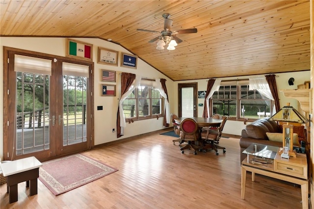 dining space featuring a wealth of natural light, french doors, wood ceiling, and lofted ceiling