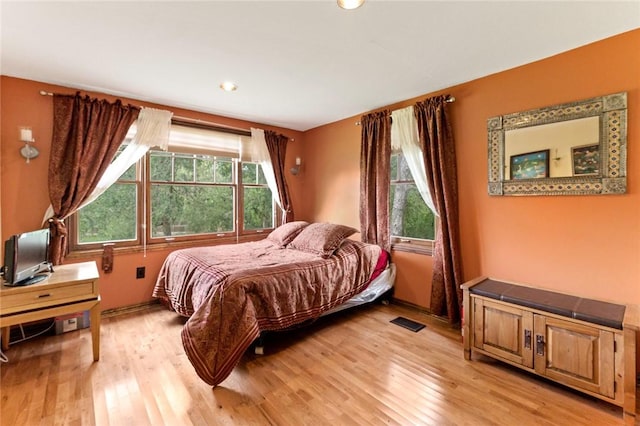 bedroom featuring light hardwood / wood-style flooring