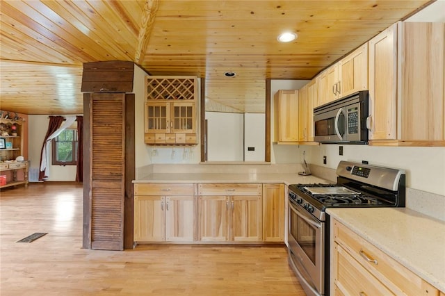 kitchen featuring wood ceiling, light brown cabinetry, stainless steel appliances, and light wood-type flooring