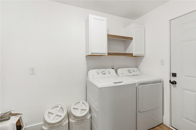 1406 Hwy 72, Three Rivers, TX 78071 - laundry area with cabinet space and washing machine and dryer