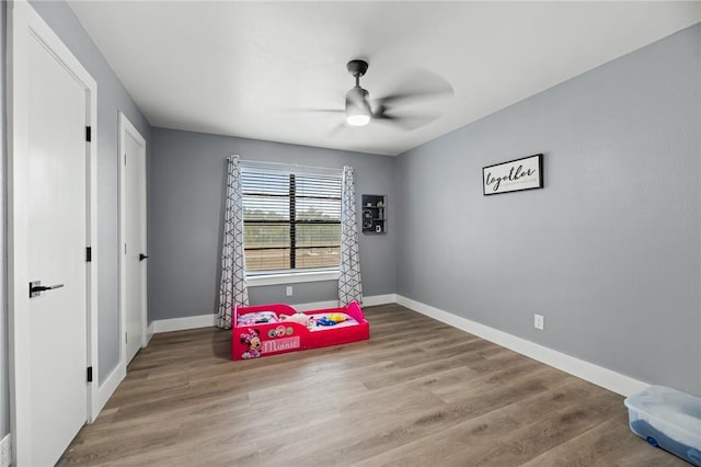 1406 Hwy 72, Three Rivers, TX 78071 - bedroom with wood finished floors and ceiling fan