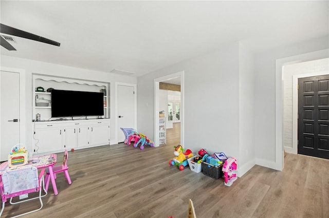 1406 Hwy 72, Three Rivers, TX 78071 - rec room featuring wood finished floors and a ceiling fan