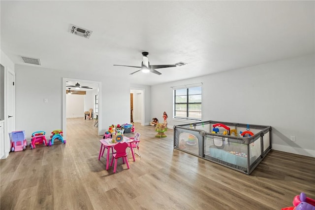 1406 Hwy 72, Three Rivers, TX 78071 - playroom featuring ceiling fan and wood finished floors