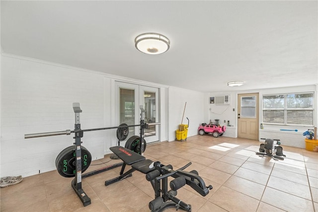 1406 Hwy 72, Three Rivers, TX 78071 - workout area with french doors, tile patterned flooring, and a wall mounted AC