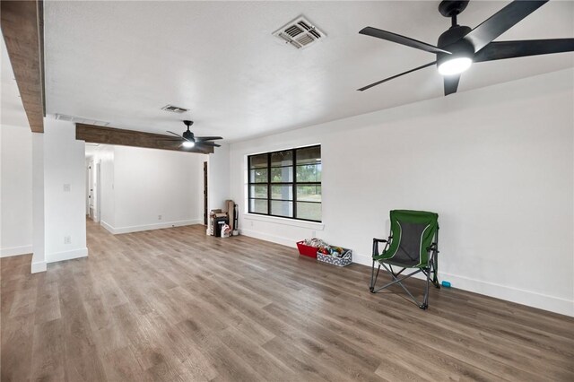 1406 Hwy 72, Three Rivers, TX 78071 - unfurnished room with a ceiling fan and wood finished floors
