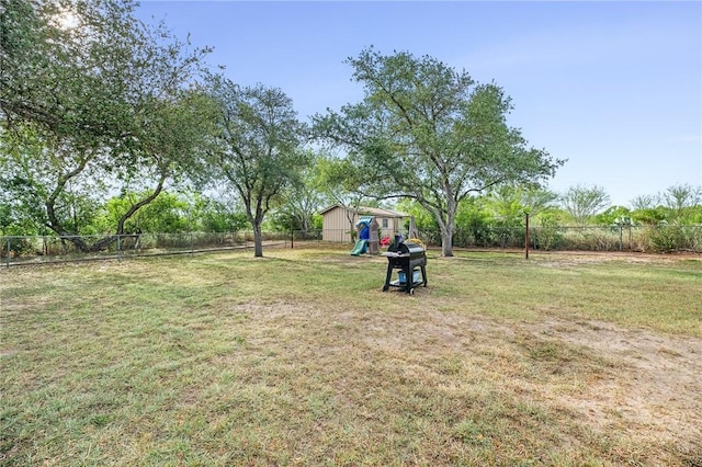 1406 Hwy 72, Three Rivers, TX 78071 - fenced backyard featuring a storage shed