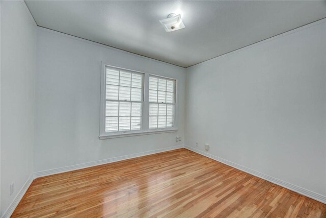 3730 Fort Worth St, Corpus Christi, TX 78411 - spare room featuring light wood finished floors and baseboards