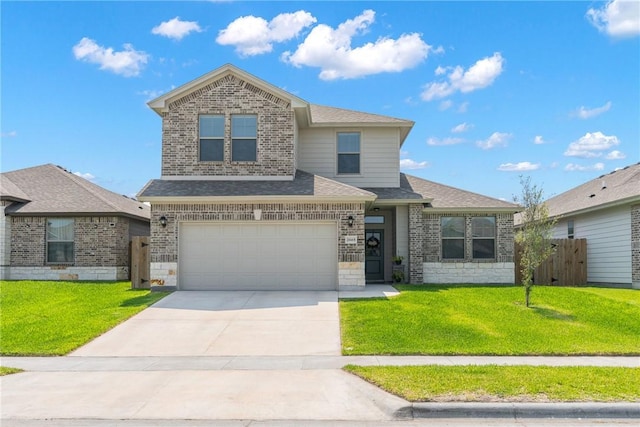 view of front of house featuring brick siding, concrete driveway, fence, a garage, and a front lawn