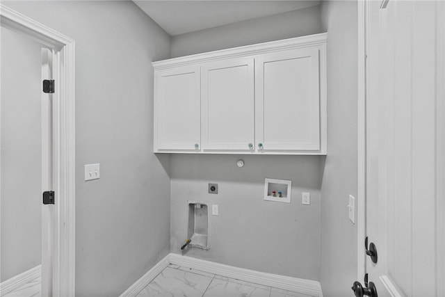 4122 Nadia Dr, Corpus Christi, TX 78414 - clothes washing area featuring baseboards, marble finish floor, hookup for a washing machine, hookup for an electric dryer, and cabinet space