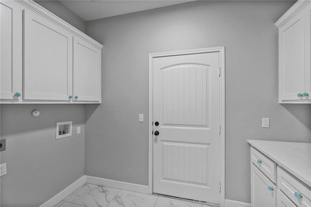 4122 Nadia Dr, Corpus Christi, TX 78414 - clothes washing area with baseboards, marble finish floor, washer hookup, cabinet space, and electric dryer hookup
