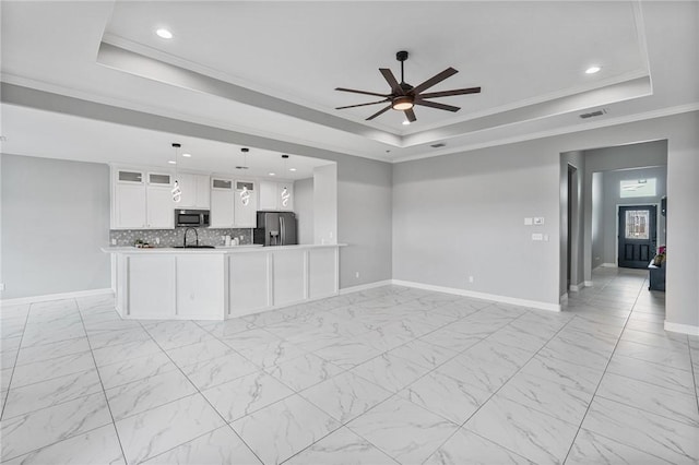 4122 Nadia Dr, Corpus Christi, TX 78414 - unfurnished living room with a ceiling fan, visible vents, a raised ceiling, and recessed lighting