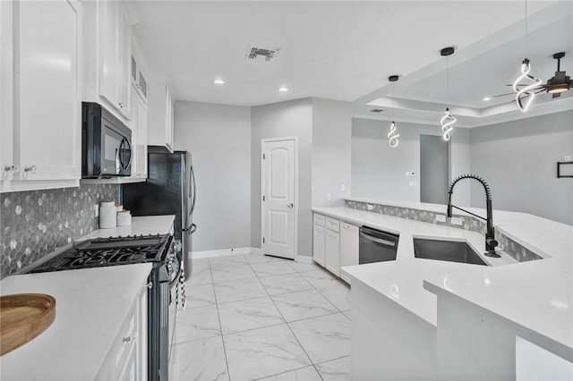 4122 Nadia Dr, Corpus Christi, TX 78414 - kitchen featuring a sink, visible vents, stainless steel range with gas cooktop, marble finish floor, and black microwave