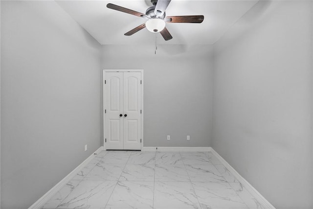 4122 Nadia Dr, Corpus Christi, TX 78414 - empty room featuring a ceiling fan, marble finish floor, and baseboards