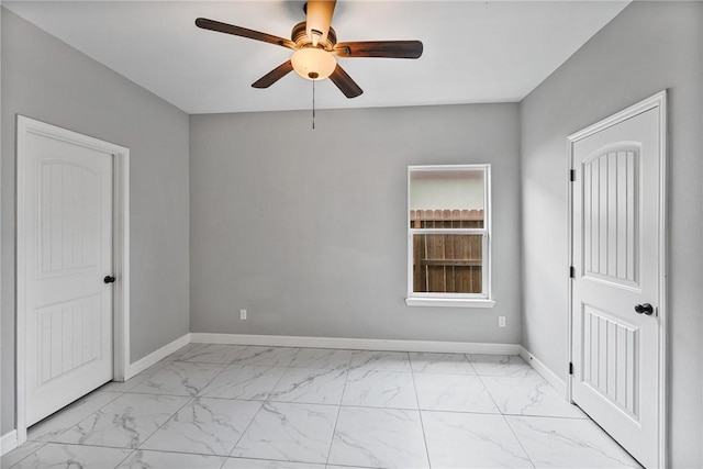 4122 Nadia Dr, Corpus Christi, TX 78414 - spare room with a ceiling fan, marble finish floor, and baseboards