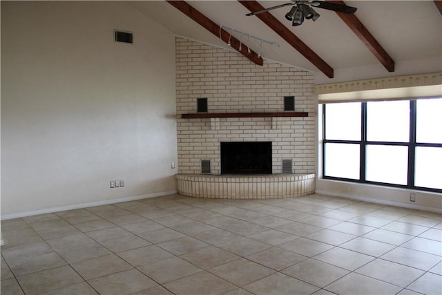 unfurnished living room with a brick fireplace, beam ceiling, ceiling fan, high vaulted ceiling, and light tile patterned flooring