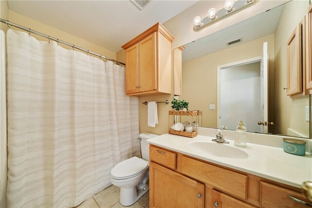 5909 Sutherland Dr, Corpus Christi, TX 78414 - bathroom with vanity, tile patterned floors, and a shower with curtain