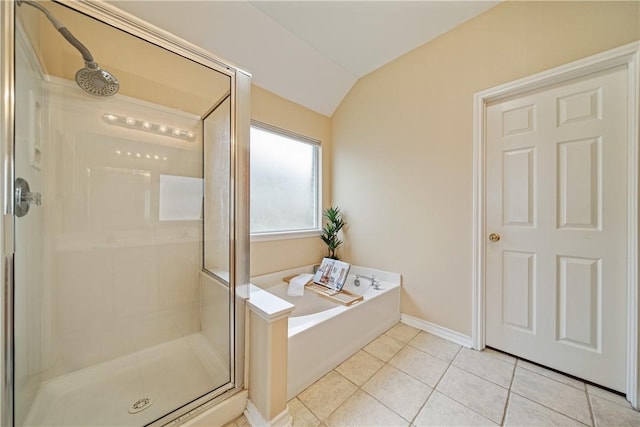 5909 Sutherland Dr, Corpus Christi, TX 78414 - bathroom with a stall shower, vaulted ceiling, a bath, and tile patterned flooring