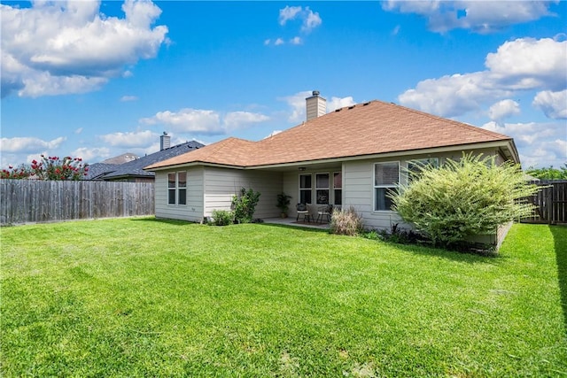 5909 Sutherland Dr, Corpus Christi, TX 78414 - back of property featuring a fenced backyard, a chimney, a patio area, and a shingled roof