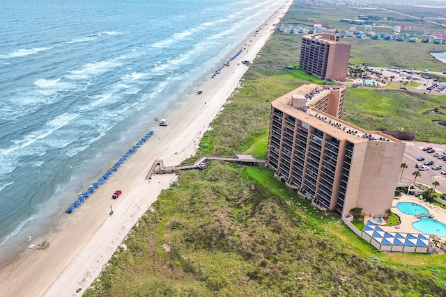 drone / aerial view with a view of the beach and a water view