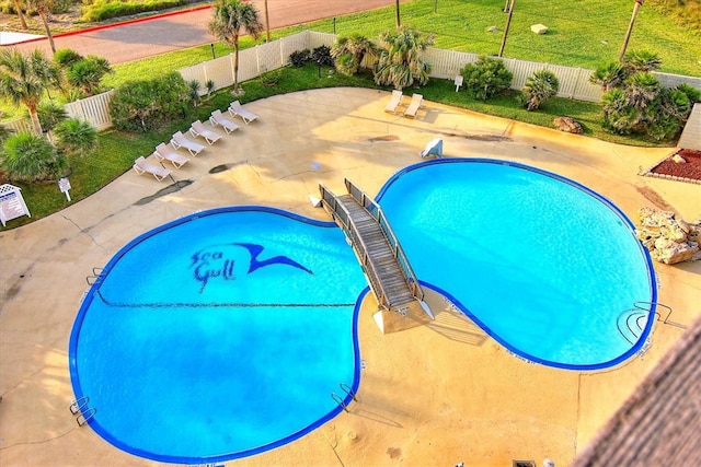 view of swimming pool featuring a patio