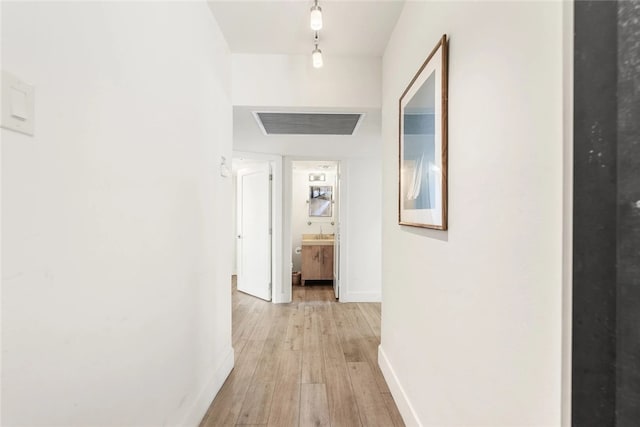 hall featuring light hardwood / wood-style flooring