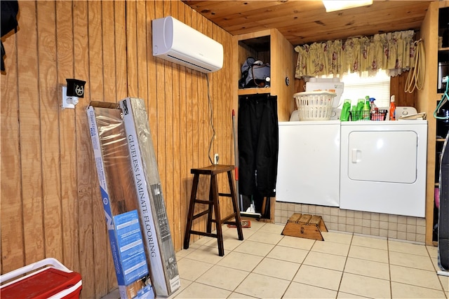 laundry area featuring wood walls, wooden ceiling, separate washer and dryer, a wall unit AC, and light tile patterned floors