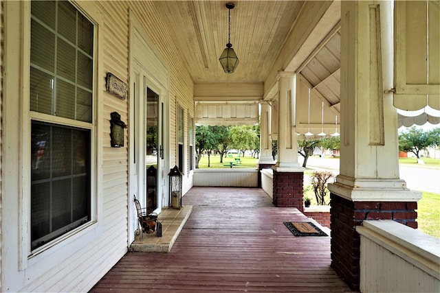 wooden terrace with covered porch