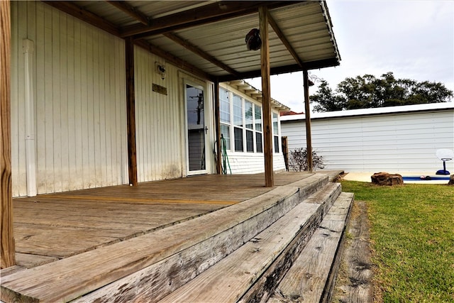 deck featuring a yard