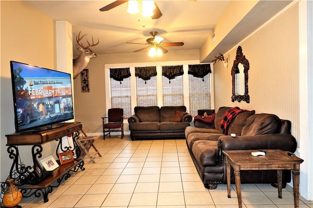 living room featuring ceiling fan and light tile patterned floors