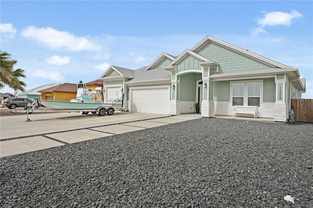 15509 Finistere St, Corpus Christi, TX 78418 - view of front of house with an attached garage, driveway, and fence