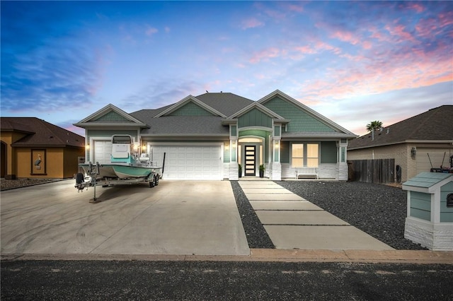 15509 Finistere St, Corpus Christi, TX 78418 - view of front facade featuring a garage, concrete driveway, and fence