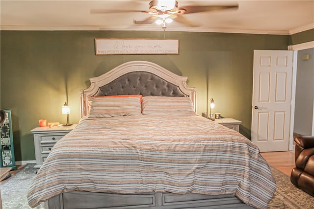 bedroom featuring ceiling fan and crown molding