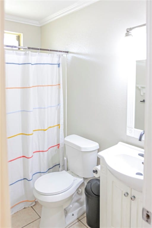 bathroom with ornamental molding, a shower with curtain, vanity, tile patterned flooring, and toilet