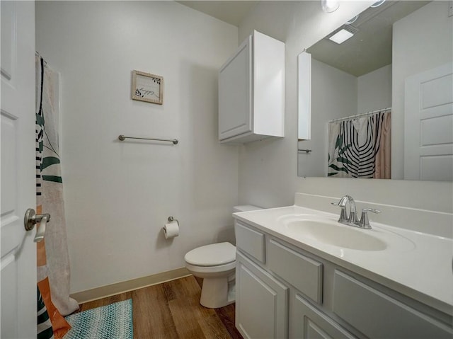15017 Beach Walk Loop, Corpus Christi, TX 78418 - full bath featuring wood finished floors, toilet, vanity, and baseboards